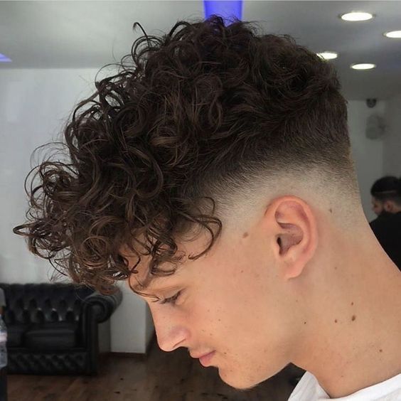 Men's Haircuts with Curly Bangs for 2022 3