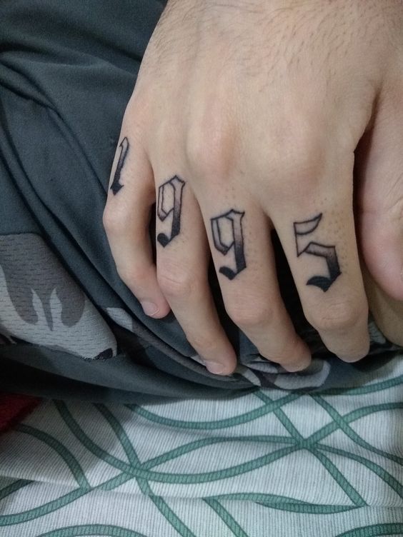 Male Finger Tattoo 1