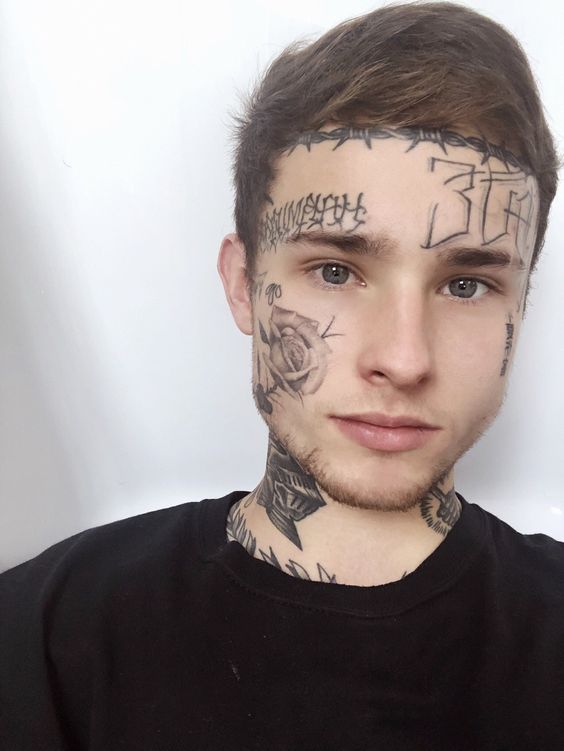 Tatuagem Masculina no Rosto 1