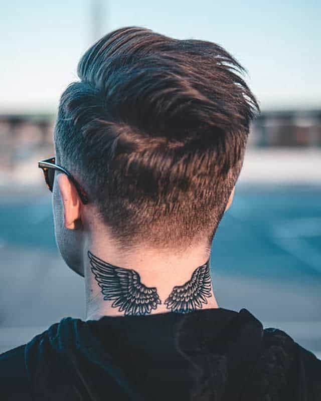 Tatuaggi da uomo sulla parte posteriore del collo 1