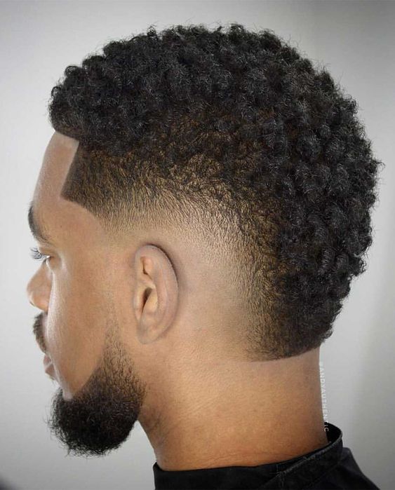 Men's Curly and Afro Mohawk Haircuts with Fade