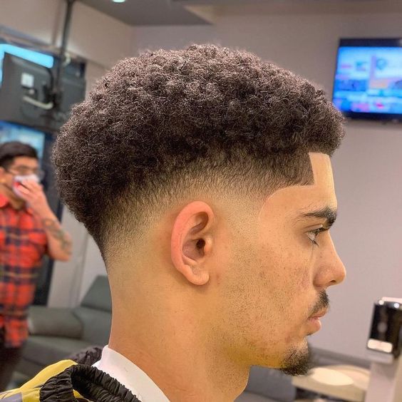 Men's Taper Fade Haircuts with Textured Top