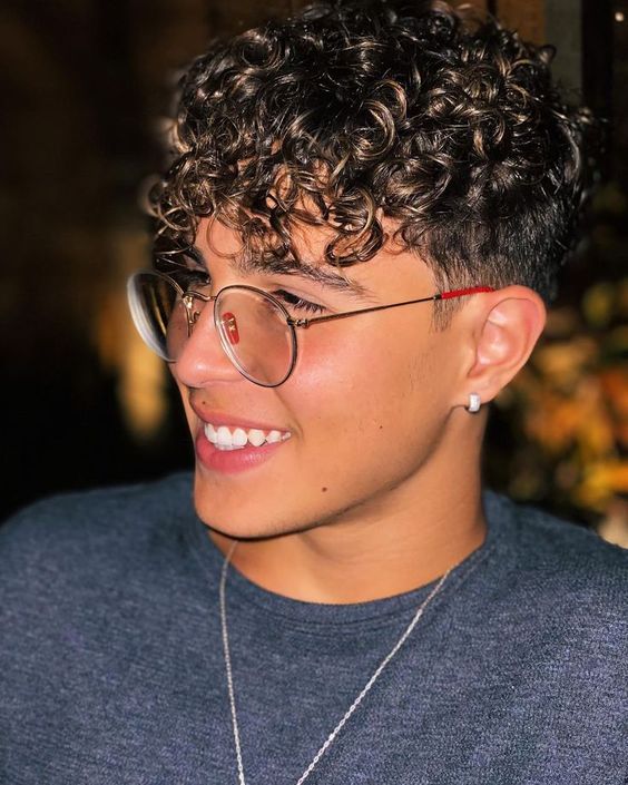 Men's Wavy Fade Haircuts with Curly Bangs