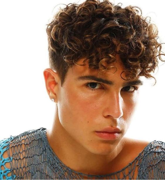 Men's Wavy Fade Haircuts with Curly Bangs