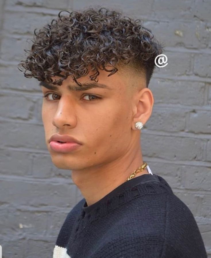 Men's Wavy Fade Haircuts with Curly Bangs