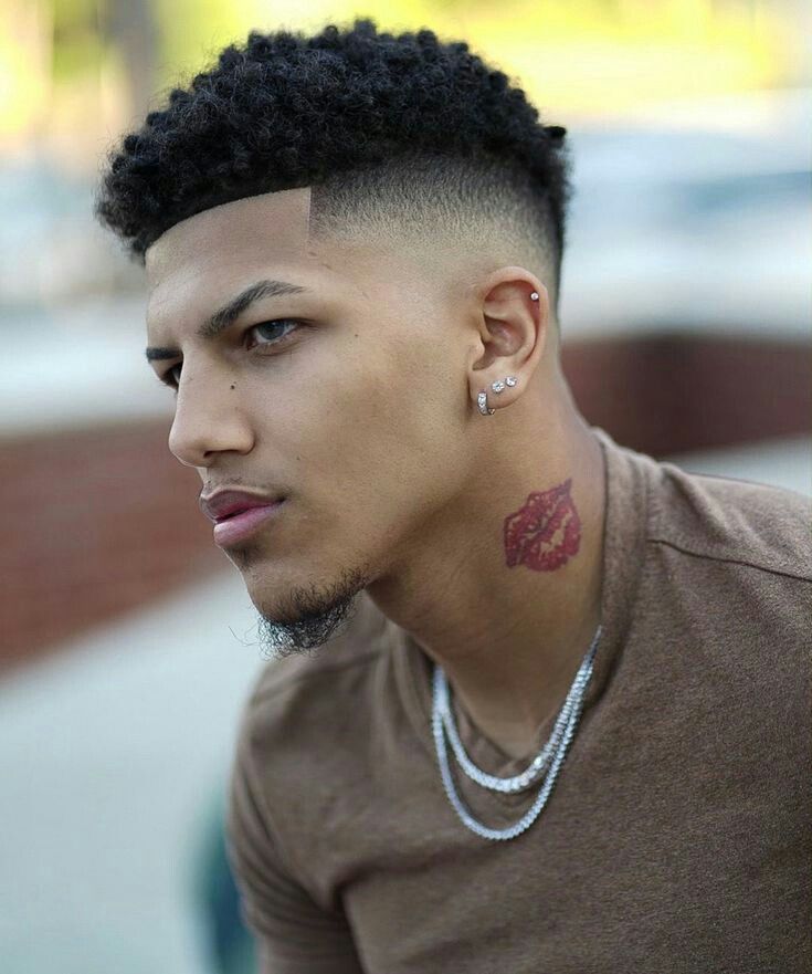 Men's Undercut Haircuts with Voluminous Top